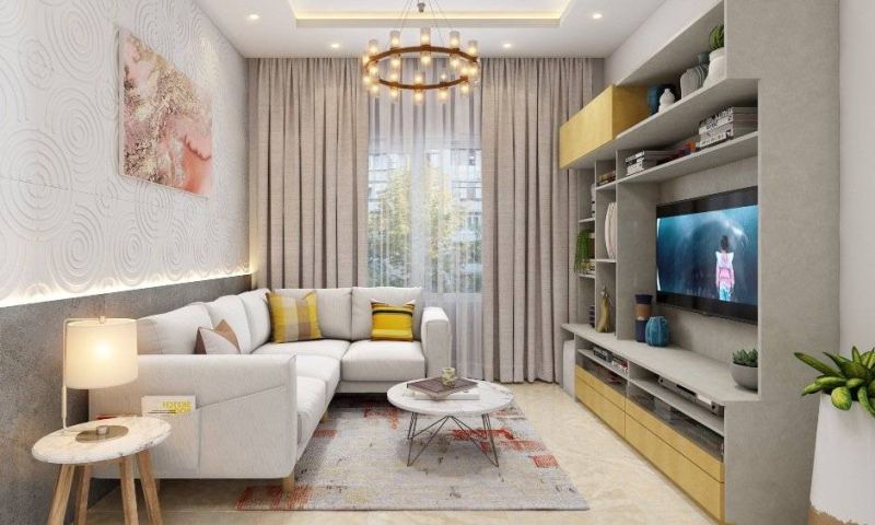 A Modern Living Room With A TV Unit Designed With Storage